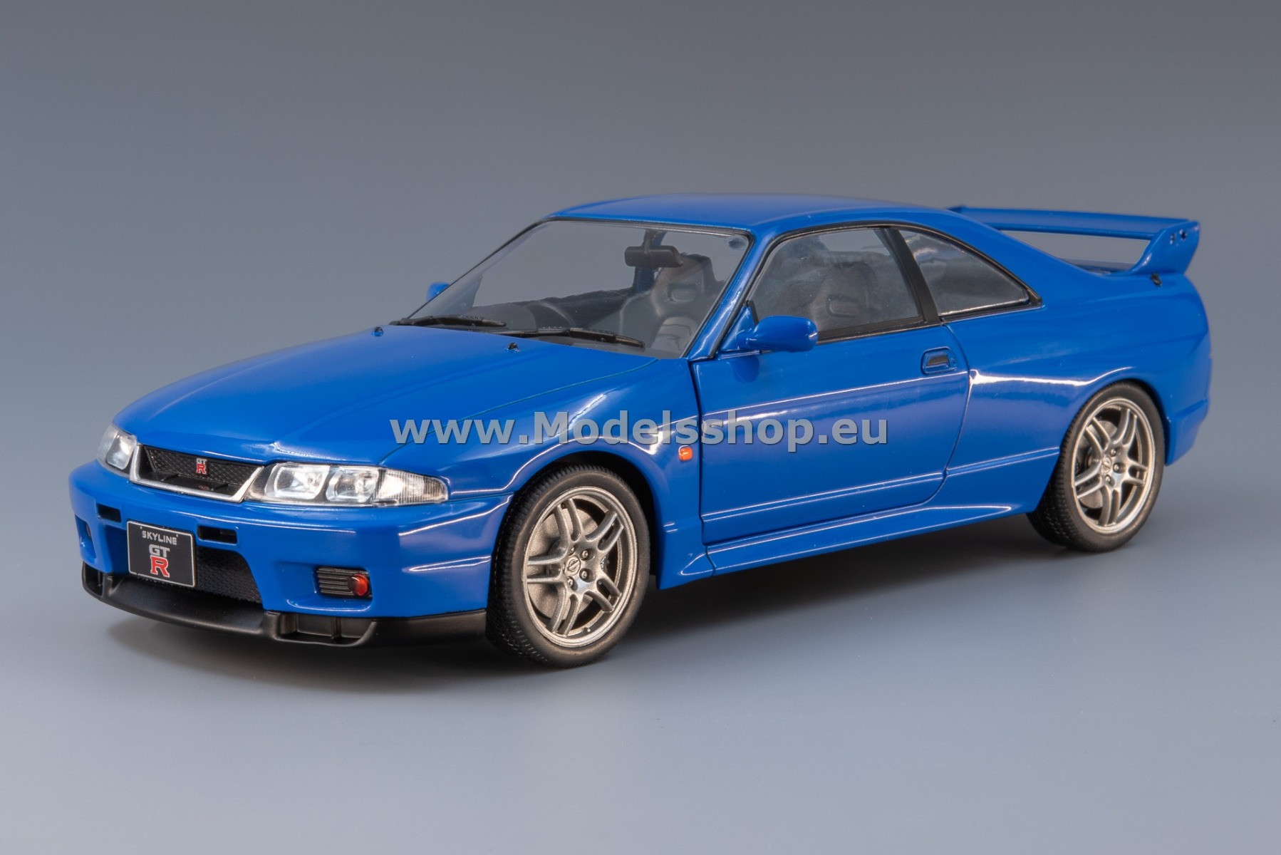 WhiteBox WB124172-O Nissan Skyline GT-R (R33), 1997, RHD /blue/