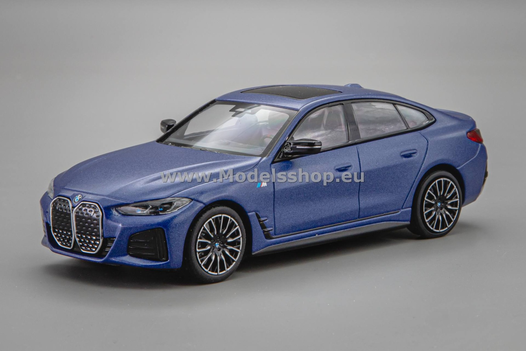 Minichamps 410024001 BMW i4 M50 (G82), 2022 /Frozen Portimao Blue Metallic/