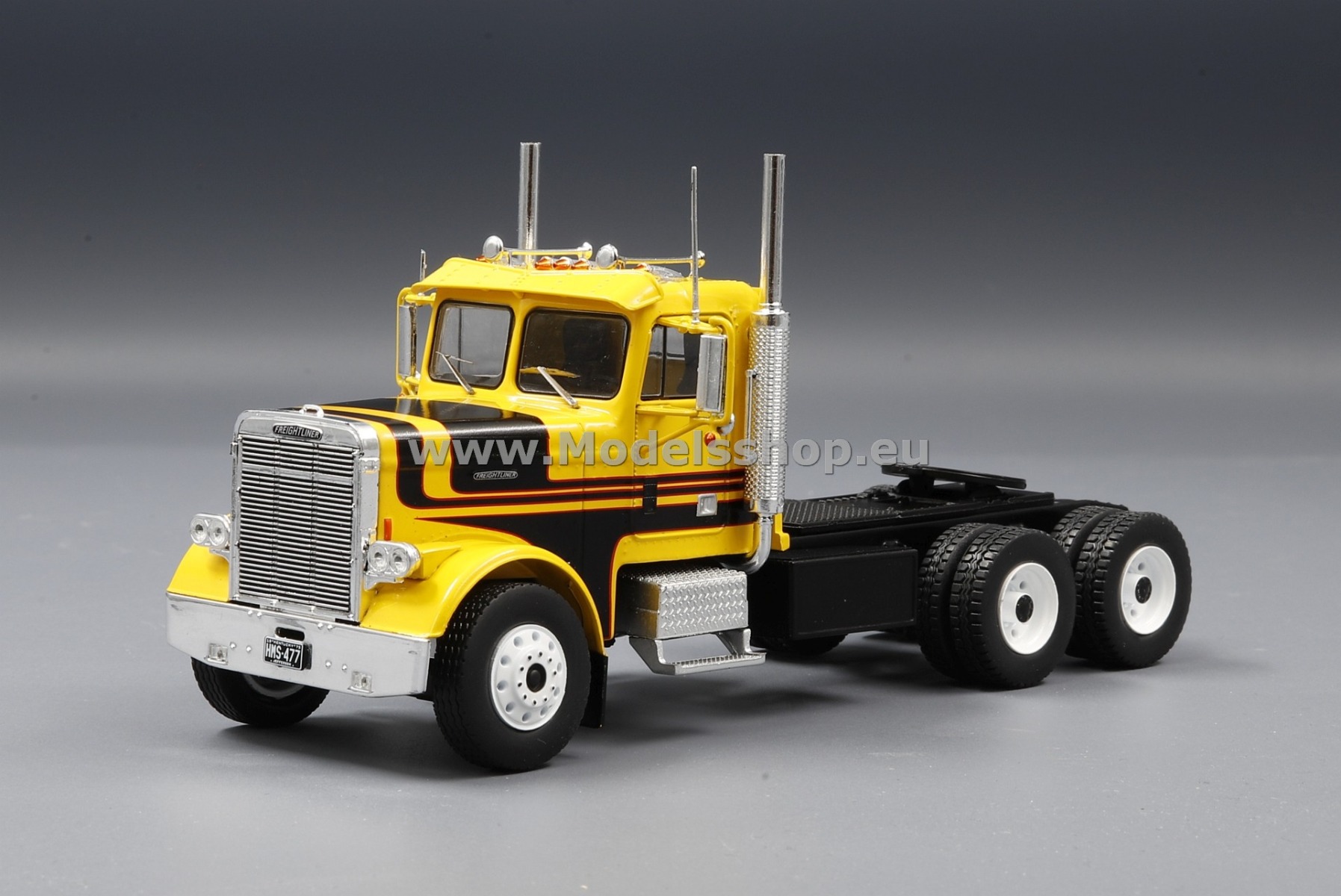 IXO TR116 Freightliner FLC 120 64 T tractor truck, 1977 /yellow - black/