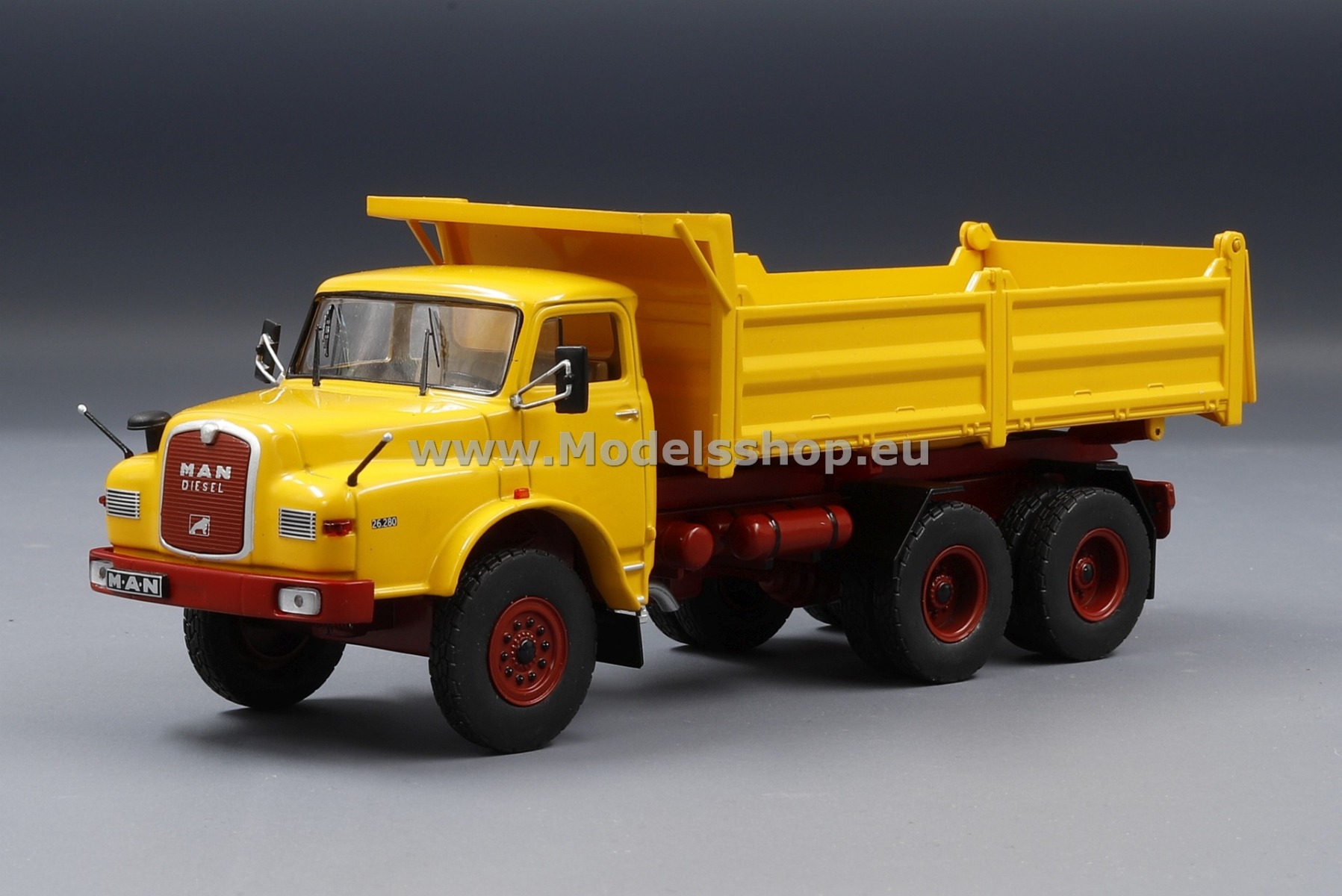 IXO TRUD003 MAN DHAK 26.280 6x6 dump truck, 1971 /dark yellow/