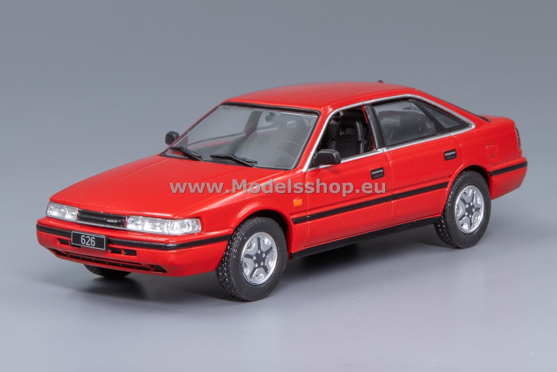 IXO CLC520N.22 Mazda 626 hatchback, 1987 /red/